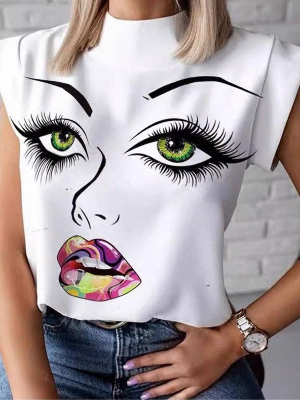 White Graphic Face Print Cap Sleeve Top with Green Eye Detail